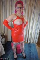 Mollie Foxxx. Red Rubber Dress Free Pic 1