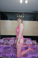 Hot Milf. Posing In A Pink Bodystocking Free Pic 2