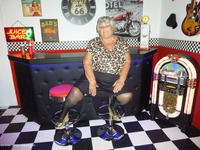 I love this American diner set and found it such fun to be posing for you at the bar and pinball machine.  I love showin
