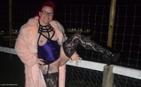 Last set of photos of me flashing outside in my fir coat and lingerie. 